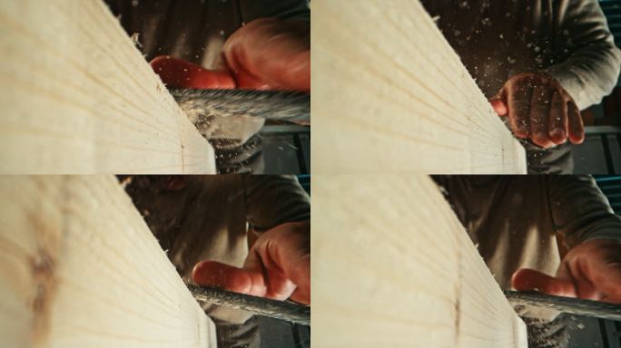 SLO MO DS木匠使用锉刀塑造木梁