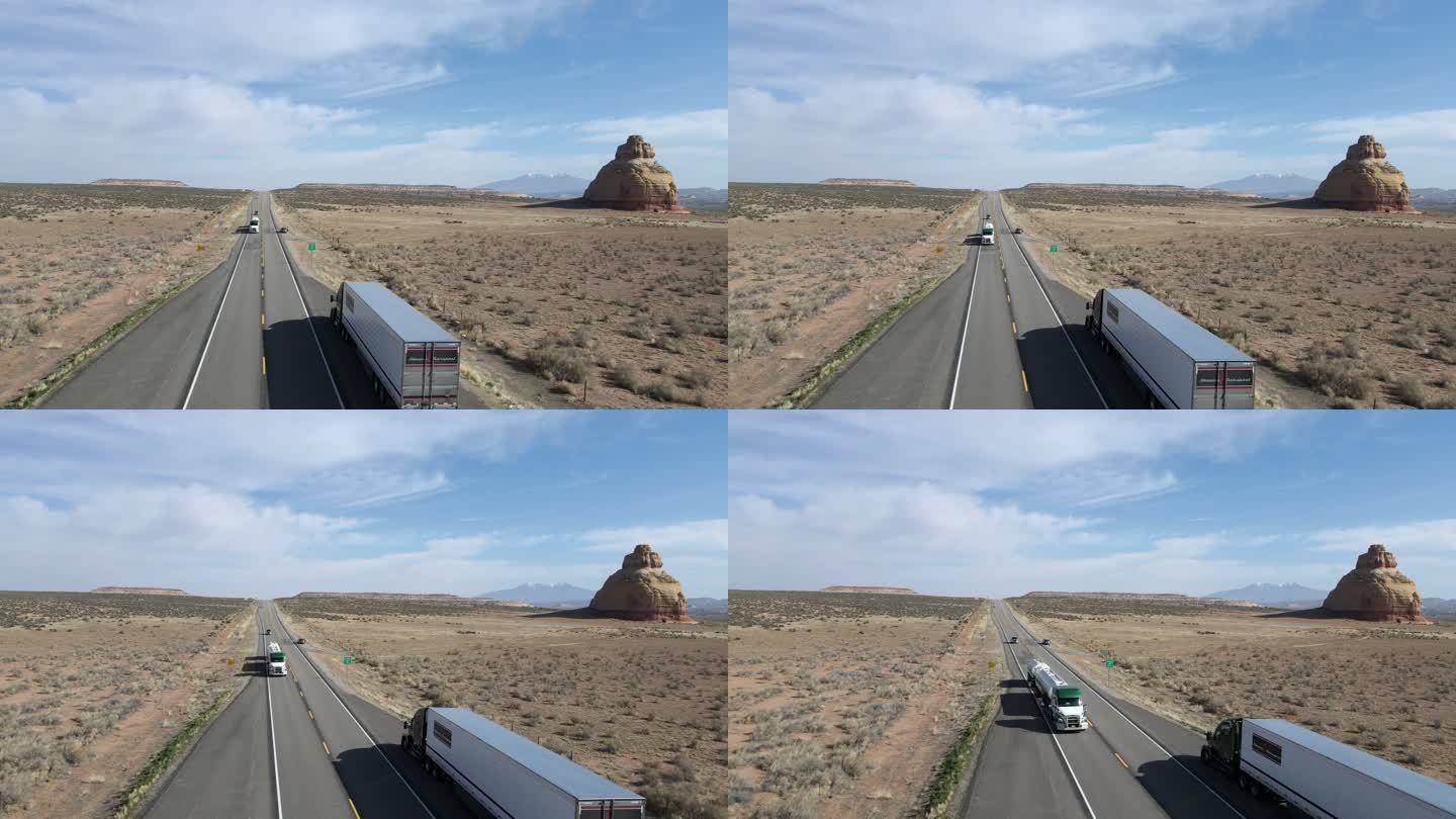 摩押附近犹他州西南部沙漠黄昏四车道公路鸟瞰图