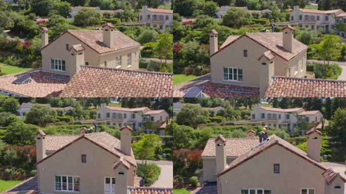 安装在屋顶上的太阳能电池板的4k无人机镜头