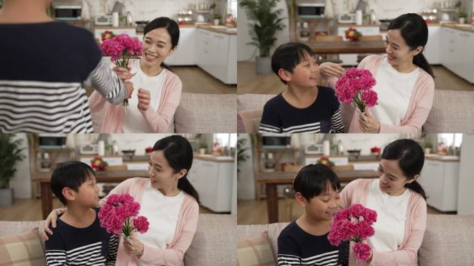 亚洲男孩在家里给妈妈送母亲节花的后视图。微笑的女人轻轻地抚摸儿子的脸，闻着花束，一边说谢谢