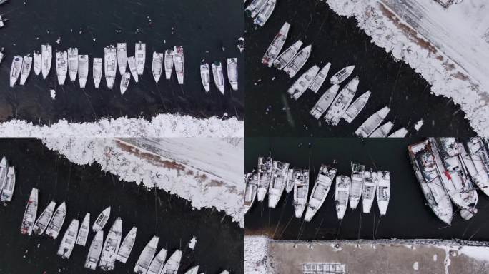 冬日烟台西口码头风雪中的渔船