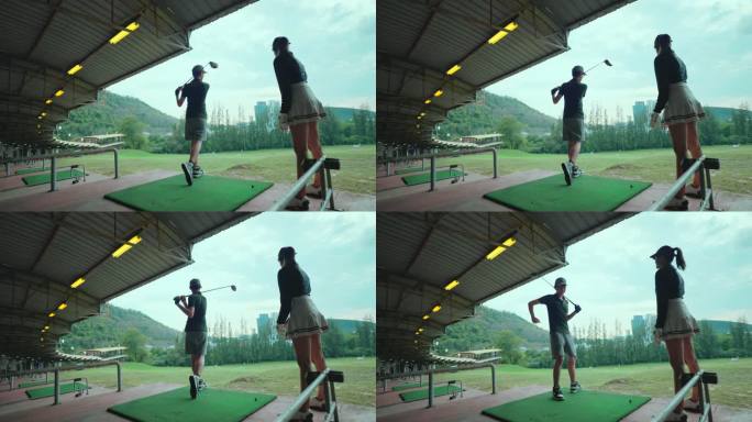 亚洲年轻女子高尔夫球手在高尔夫练习场教年轻人打高尔夫球。