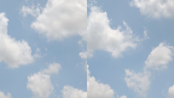 明亮的天空云景背景。4k垂直镜头。