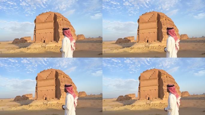 年轻的沙特人看着著名的石刻墓，赫格拉