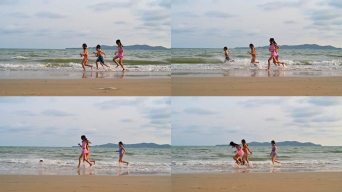享受海洋夏天海边嬉戏海浪戏水追逐奔跑