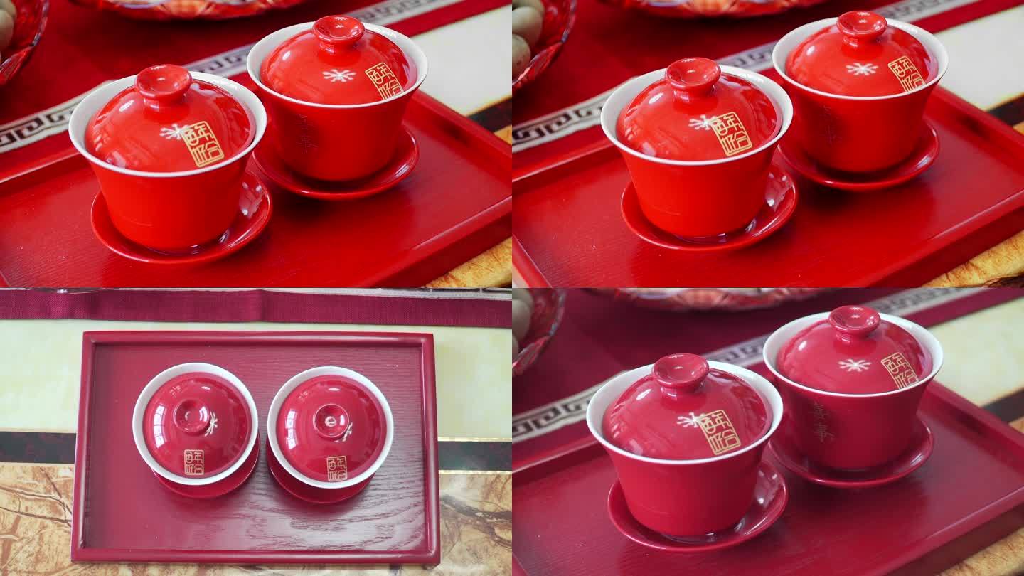 红色托盘敬茶的茶碗