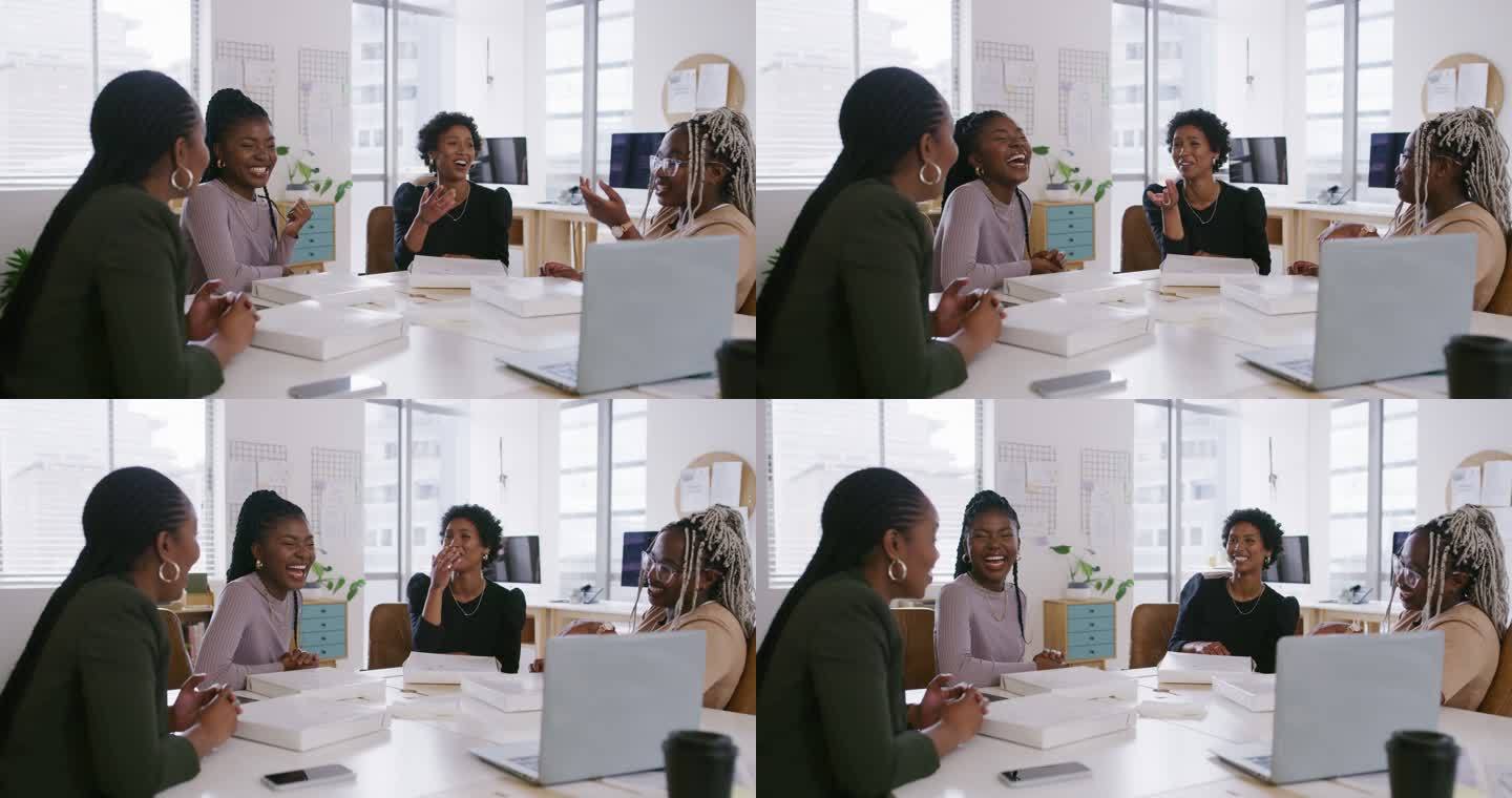 一群年轻的同事在办公室里一起吃午饭。工作时只吃披萨的黑人女性。