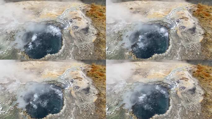 黄石公园喷发出气泡的间歇泉特写