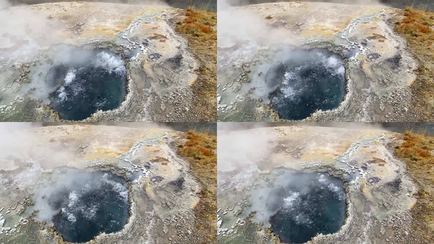 黄石公园喷发出气泡的间歇泉特写
