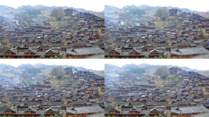 苗族村炊烟缭绕农村早晨的村庄