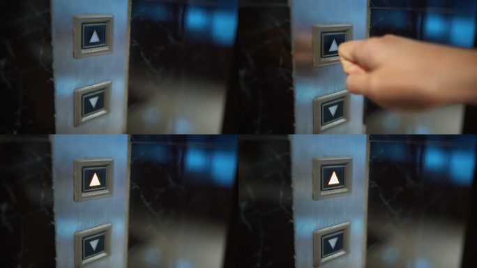 女士手避免用指尖按压电梯或升降机内的按钮
