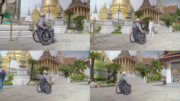 曼谷概念轮椅旅游地标。亚洲男性游客泰国曼谷Wat Phra Keao大皇宫游客