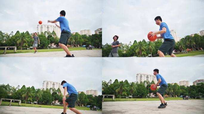 Z一代亚洲中国青少年男孩在周末早上与朋友一起练习篮球比赛，挑战球员并投篮