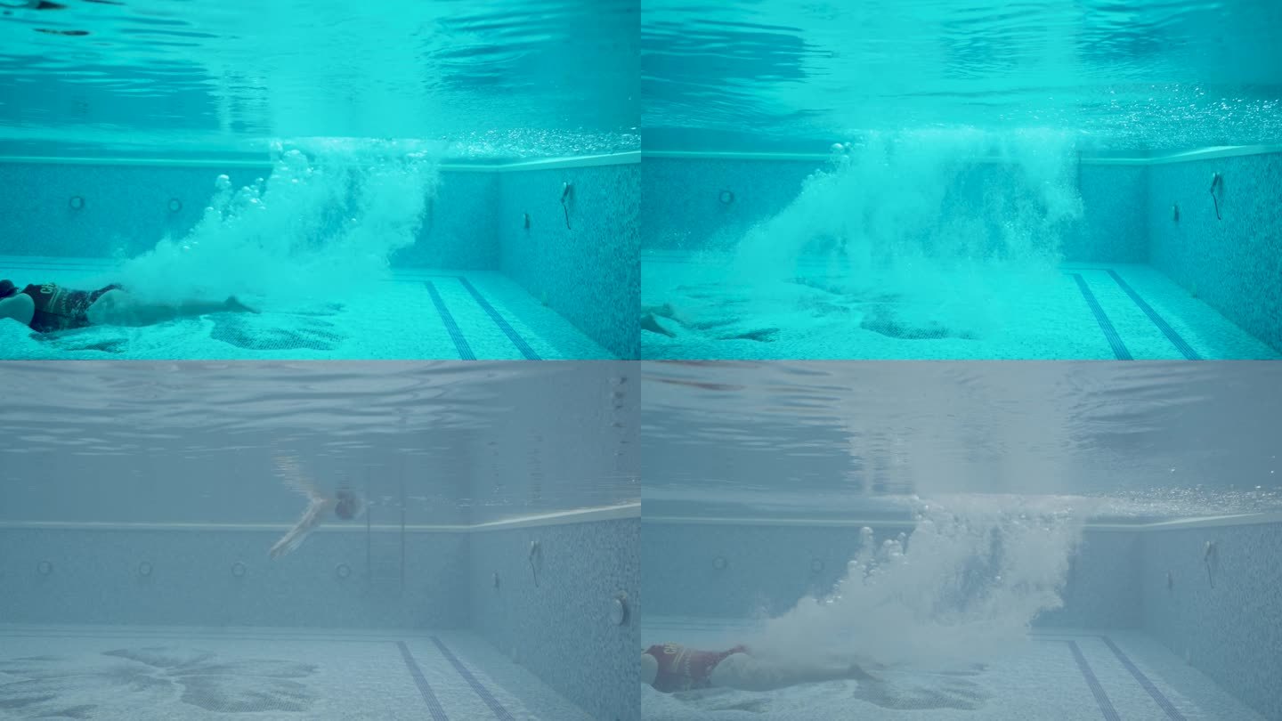 女游泳运动员跳入游泳池