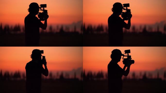 摄影师在夕阳里取景