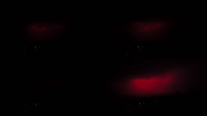 黑色背景上美丽的红色闪电。电气风暴