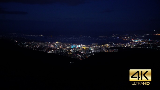 4K山顶眺望城市霓虹，夜间行驶的车灯