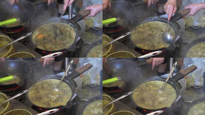 一位厨师在制作油茶，中国广西桂林特色菜肴