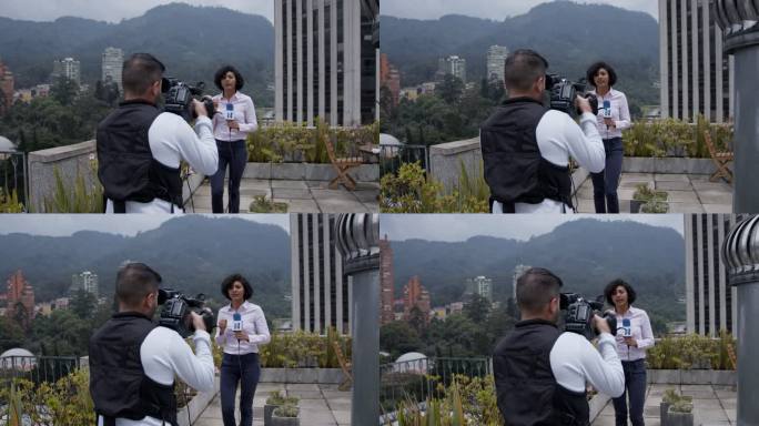 黑人女新闻记者报道现场行走，而摄影师向后走去记录她。