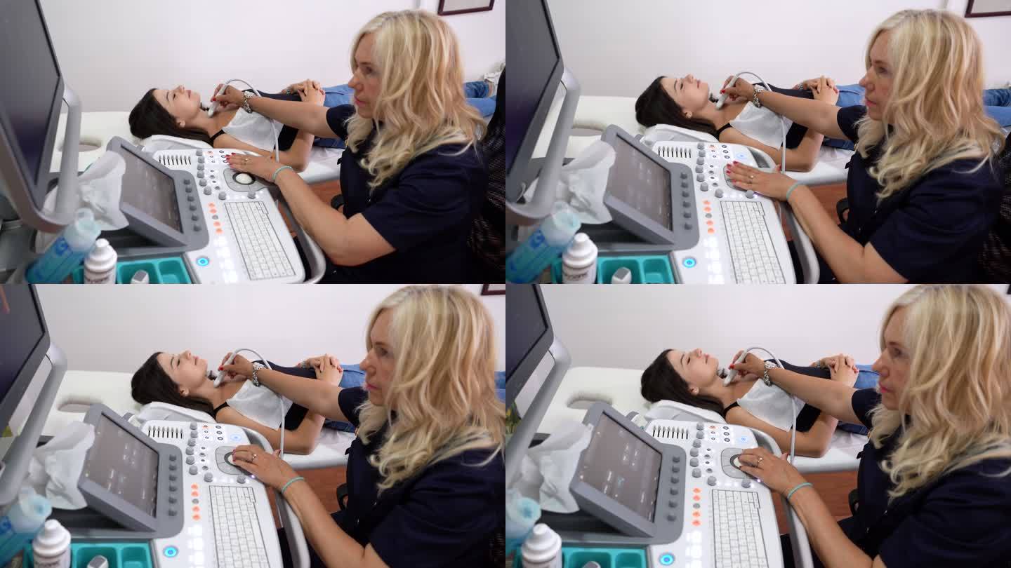 女医生使用超声波扫描仪检查患者甲状腺