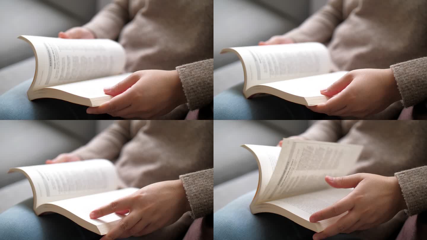 一位女士在家休息时看书的特写镜头