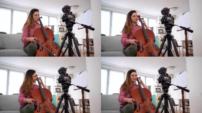 在家里放大提琴时拍摄视频的女人