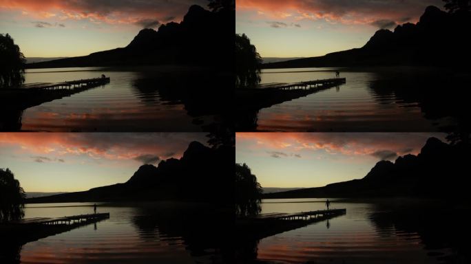 游泳者站在码头上清晨朝阳夜幕降临湖光山色