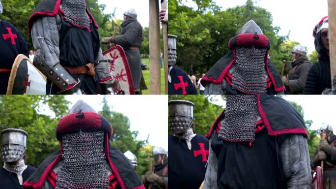 一位身穿盔甲、手持长剑的骑士站在中世纪的节日里