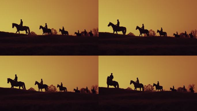 SLO MO黄昏时一群人在乡下骑马的剪影