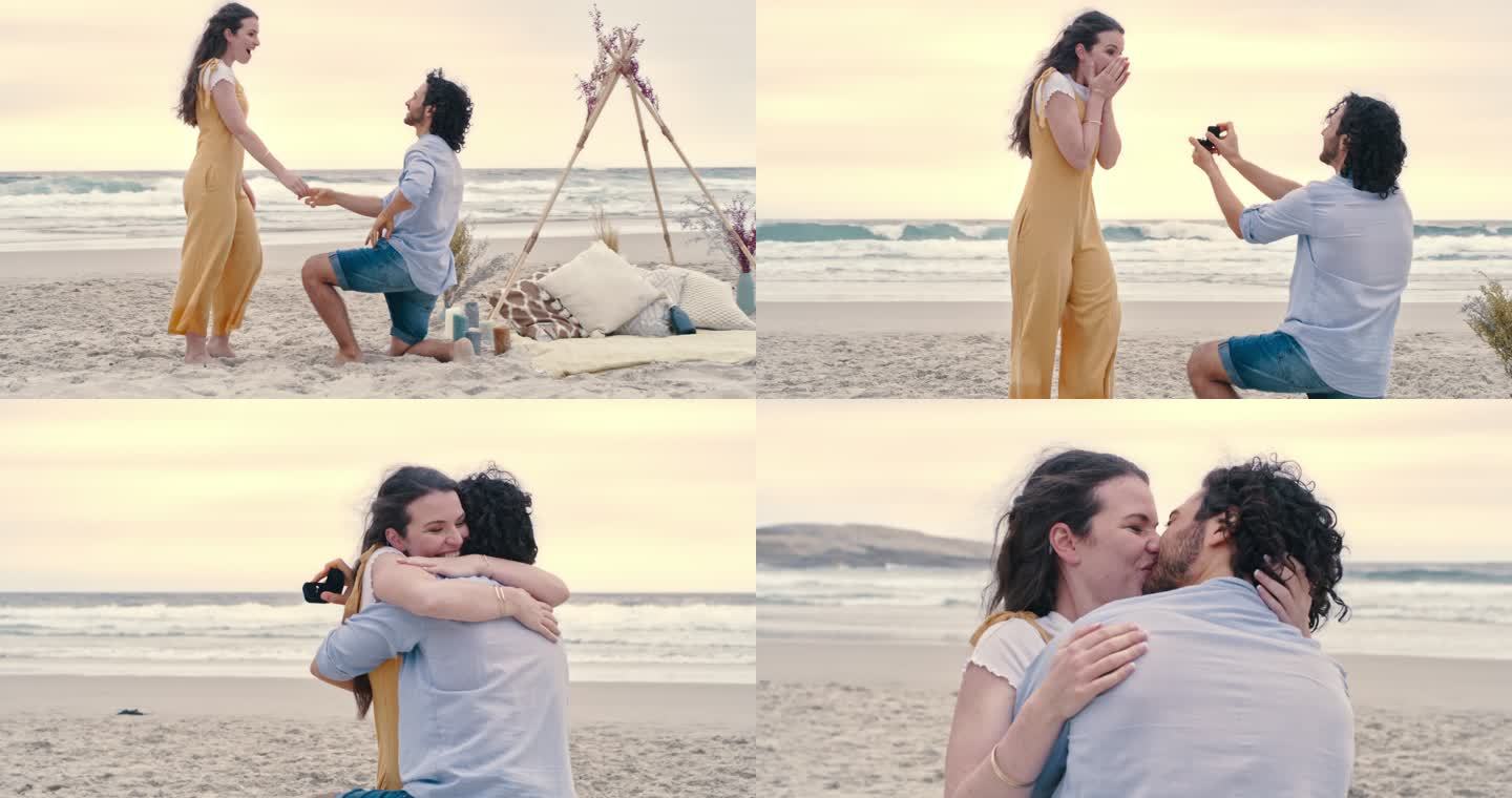一对幸福的年轻夫妇在海滩求婚。一个年轻人向女友展示订婚戒指