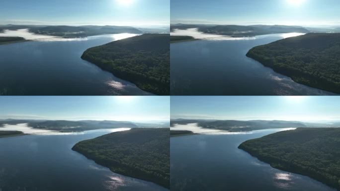 航拍晨雾缭绕的湖泊