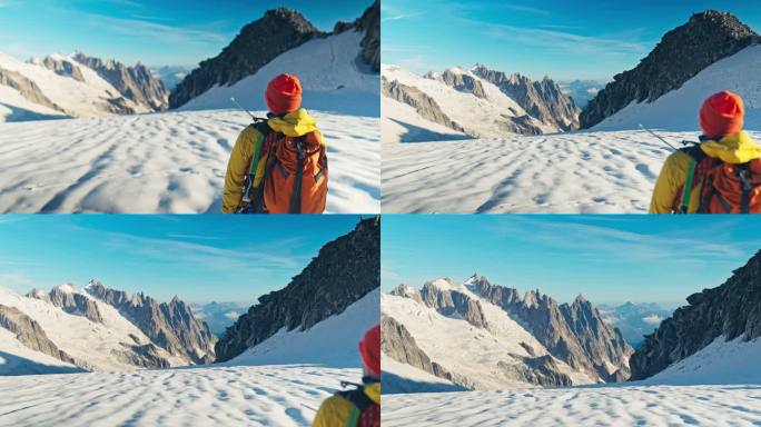登山队沿着冰雪覆盖的斜坡向下移动。使用绳索和攀爬设备。欧洲阿尔卑斯山
