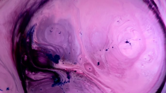 抽象慢动作墨水背景超级鲜艳的彩色颜料宇宙漩涡和波浪流动形式