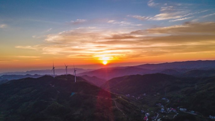 4K航拍大山风车夕阳晚霞落日延时摄影