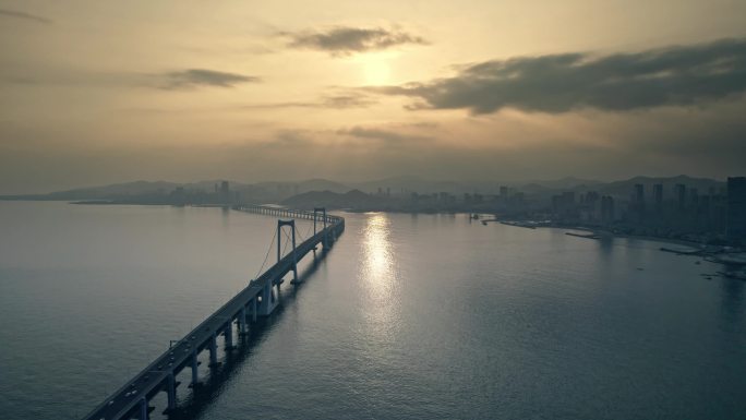 大连星海湾跨海大桥日落城市开场航拍