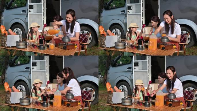 快乐的多代亚洲家庭在沙滩露营车公路旅行期间享受美食和饮料。露营车旅行系列