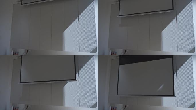 现代家居装修的白色收纳柜和电动投影幕布