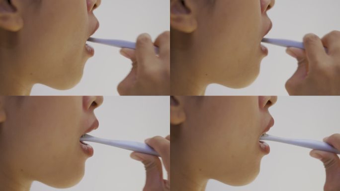 亚洲女性刷牙早晚刷牙牙齿