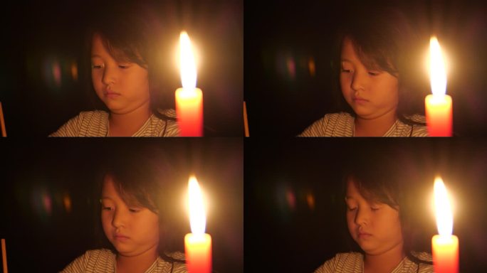 烛光下写作学习写信蜡烛儿童小孩小女孩
