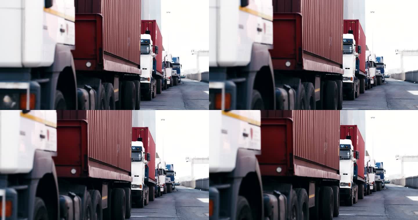 仓库里卡车排成一行的4k视频片段
