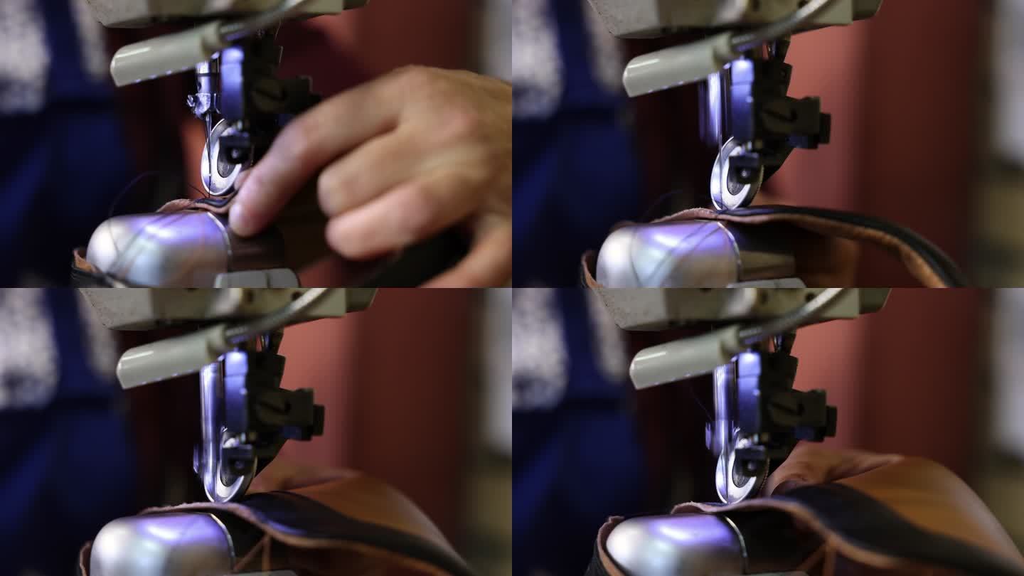无法识别的鞋匠，在缝纫机上缝制鞋的皮革部分