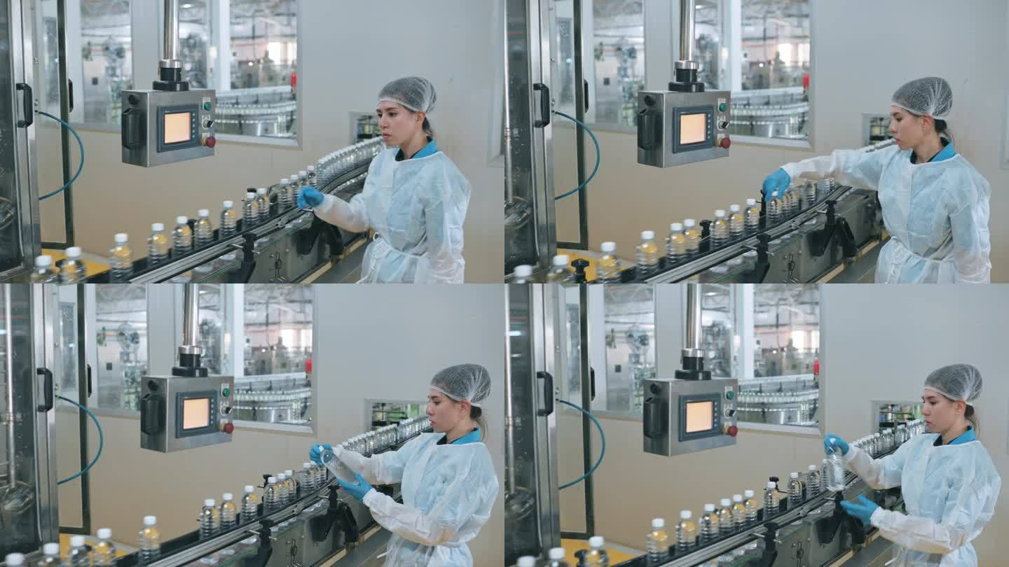 亚裔中国女性生产线工人，穿着洁净服PPE QC，在装瓶厂矿泉水饮用水厂的水瓶灌装机中工作