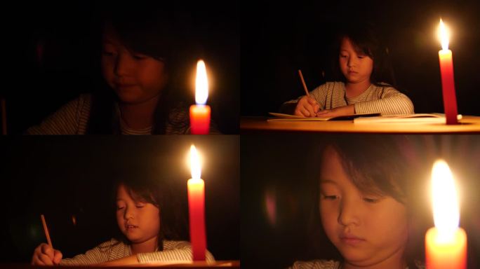 写作业晚上烛光小学生刻苦学习做题写字蜡烛