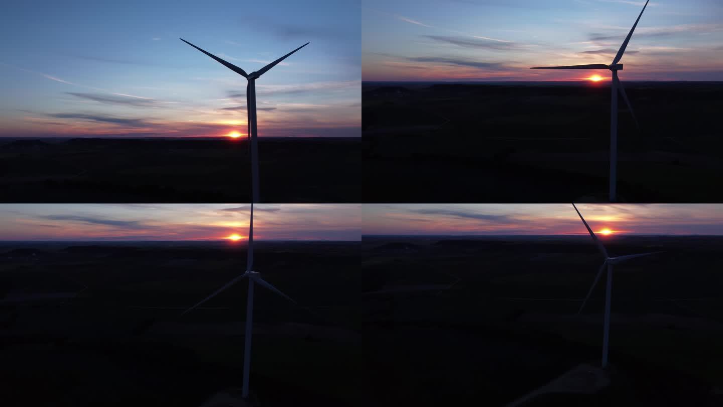 傍晚太阳落山时的风力涡轮机