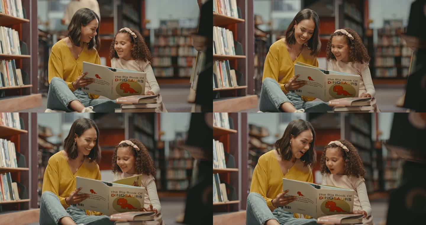 两个女人只坐在图书馆的地板上一起读书。图书馆里可爱的女儿和母亲。