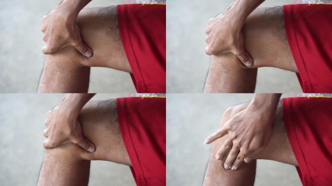 男性使用按摩药丸进行膝盖按摩以缓解疼痛。