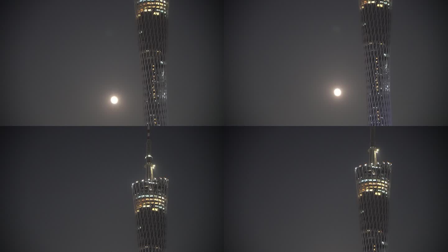夜晚广州塔和月亮在一起
