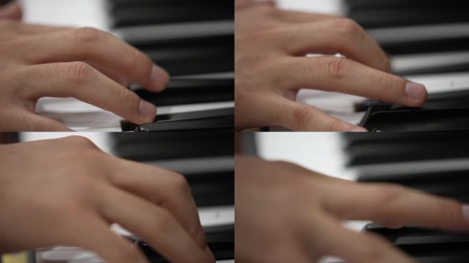 男孩双手演奏弹钢琴曲特写琴键实拍原素材