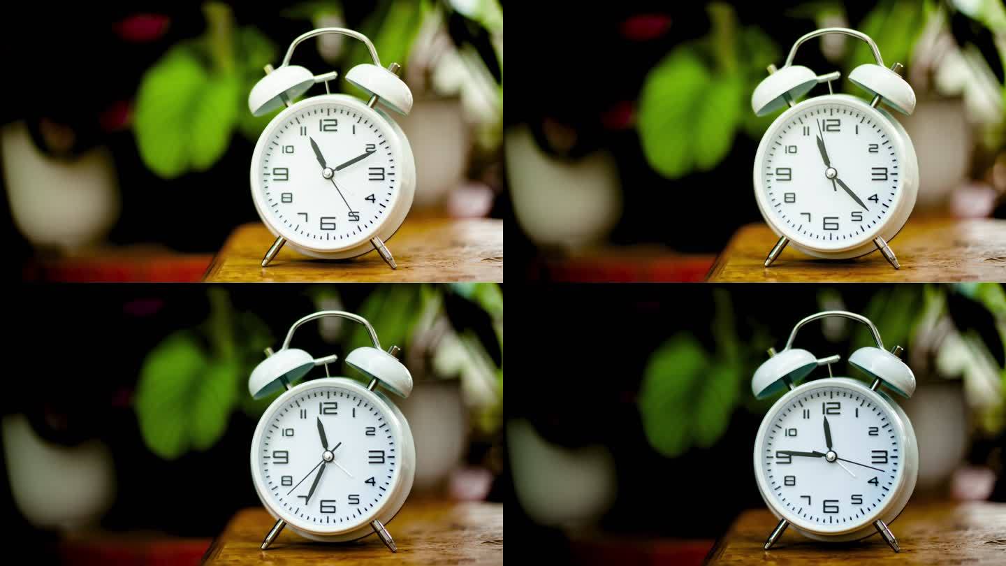 时间和工作白色闹钟以极快的速度走动生命中的时间概念