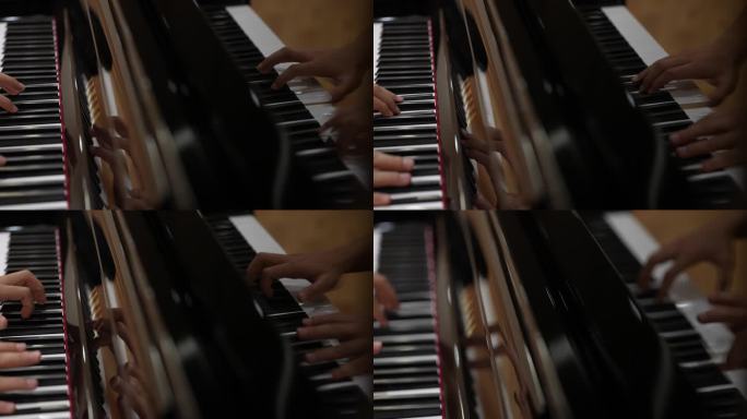 双手演奏弹钢琴曲手指特写黑白琴键实拍素材